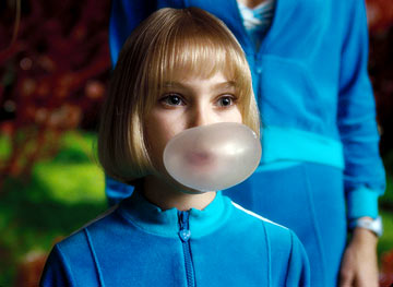 Charlie and the Chocolate Factory  - Most nights in the Bucket home, dinner is a watered-down bowl of cabbage soup, which young Charlie gladly shares with his mother and father and both pairs of grandparents. Every night, the last thing Charlie sees from his window is Willy Wonka's great factory, and he drifts off to sleep dreaming about what might be inside. For nearly fifteen years, no one has seen a single worker going in or coming out of the factory, or caught a glimpse of Wonka himself, yet, great quantities of chocolate are still being made and shipped all over the world. One day Willy Wonka makes a momentous announcement. He will open his famous factory and reveal 'all of its secrets and magic' to five lucky children who find golden tickets hidden inside five randomly selected Wonka chocolate bars. Nothing would make Charlie's family happier than to see him win but the odds are very much against him as they can only afford to buy one chocolate bar a year, for his birthday. One by one, news breaks around the world about the children finding golden tickets and Charlie's hope grows dimmer. But then, something wonderful happens. Charlie finds some money on the snowy street and takes it to the nearest store for a Wonka Whipple-Scrumptious Fudgemallow Delight. There, under the wrapper is a flash of gold. It's the last ticket. Charlie is going to the factory! The family decides that Grandpa Joe, who used to work in the factory, should be the one to accompany Charlie on this adventure. Once inside, Charlie is dazzled by one amazing sight after another. Wondrous gleaming contraptions of Wonka's own invention churn, pop, and whistle, crews of merry Oompa-Loompas mine mountains of fudge beside a frothy chocolate waterfall, a hundred trained squirrels on a hundred tiny stools shell nuts for chocolate bars, and Wonka himself pilots an impossible glass elevator that rockets every which way you can think of through the fantastic factory. Almost as intriguing as his fanciful inventions is Willy Wonka. He thinks about nothing but candy--except, every once in a while, when he seems to be thinking about something that happened long ago, that he can't quite talk about. Meanwhile, the other children prove to be a rotten bunch, and one by one, their greedy personalities lead them into all kinds of trouble that force them off the tour. When only Charlie is left, Willie Wonka reveals the final secret, the absolute grandest prize of all: the keys to the factory itself.