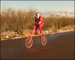 Santa - Santa riding dumb bike