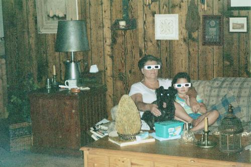 watching 3 D - very  close to  me  enjoying a 3 D  movie  and dog  that   thinks  he  is a person
