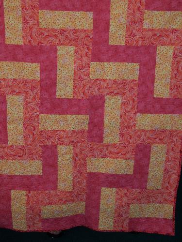 A Quilt That I Made - This is a quilt that I made. This pattern is called a Yellow Brick Road, and it was very easy.  This is a great beginner pattern for anyone that is interested.