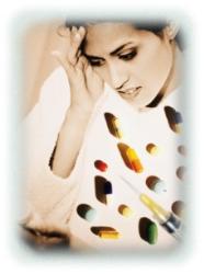 migraine - a girl suffering from migraine