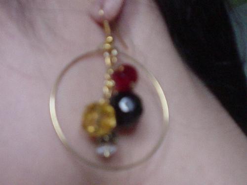 made the earrings myself - it is the first earring i ever made. it may not look perfect, but at least it looks good on me..hehe.