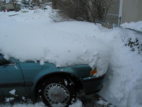 blizzard of 2006 - this is my car when I went outside on the morning of dec. 21st.guess what, I stayed home.