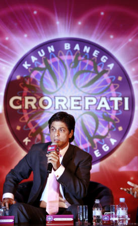 Shahrukh or Amitabh - Shahrukh has accepted to be the new host for KBC. Is it a clear sign that he is trying to prove himself greater than the God - Mr. Amitabh Bachchhan.