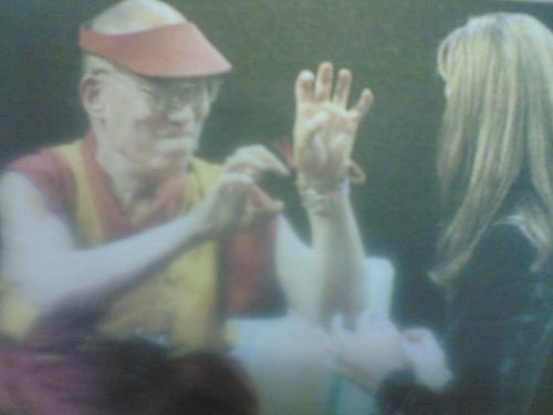 The Dalai Lama - The Dalai Lama describes how he used his fingenails as weapons when, at the age of 4, he got into a spat with his brother as Maria Shriver, wife of California Gov Arnold Schwarzenegger, listens on stage at the California Governor and First Lady's Conference on Women in California.