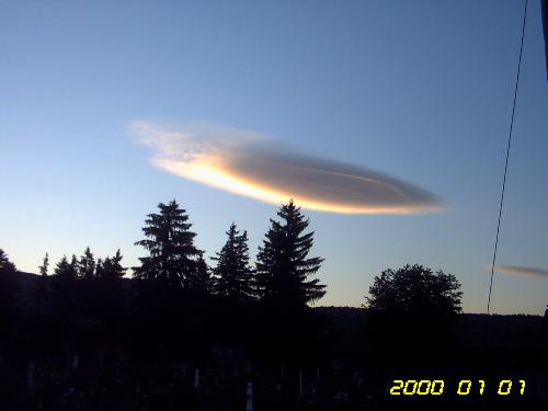 UFO on the sky with cloaking device. - This cloud is hiding the UFO I think it is Jean Luc Picarde Enterprise star ship.