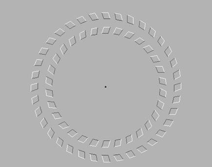 optical effects - keep focusing on the black spot and move your head closer to the screen, then see what happens.