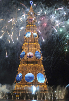 Christmas Tree special - Fire - Fire Crackers across X'mas Tree in Brazil. The tree is 82 meteres tall.