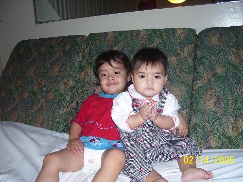 My kids - Here are my kids again. They love each other so much. They were posing for the camera so nice. After the picture was taken they started fighting. It was a good memory to see them fighting and laughing at the same time.