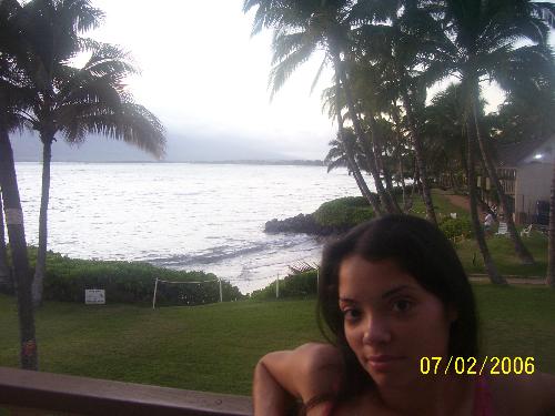 Me - Here I am in beautiful Maui. The sun was setting and I went out on the balcony to take this beautiful picture of this moment. I couldn't belive how wonderful it came out. You could see the ocean, the mountains, the palm trees, and me. All beautiful.