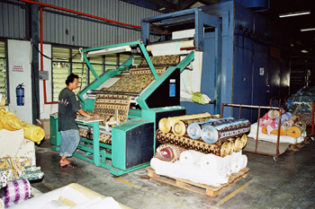 mengulung - last step of making batik