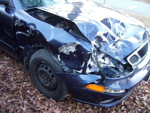 my car! - This is a photo of my car the day after I hit a deer.  It was covered in blood, but my dad washed it off before the picture was taken.