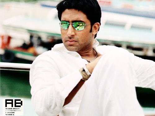 The Green Goggles - Abhishek Bachchan wid the Green Goggles on, i think this photograph was during the shooting of a popular song 'One Love' from the Movie 'Rakth'.  I like this Pic so much that i made a printout on Four A4 sized Sheets and Sticked it together top make a Big Wallpaper on my Bedroom Wall.