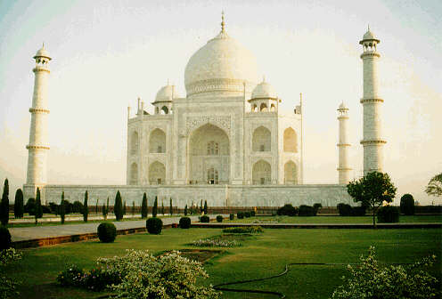 Taj Mahal - Agra, once the capital of the Mughal Empire during the 16th and early 18th centuries, is one and a half hours by express train from New Delhi. Tourists from all over the world visit Agra not to see the ruins of the red sandstone fortress built by the Mughal emperors but to make a pilgrimage to Taj Mahal, India’s most famous architectural wonder, in a land where magnificent temples and edificies abound to remind visitors about the rich civilization of a country that is slowly but surely lifting itself into an industrialized society.