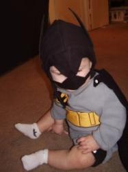 Batman!-Devyn Sean 8 months old - Here is my sweetheart. We went trick-or-treating a little although he didn't get to enjoy his candy. Maybe next year..