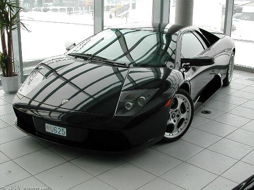 lamborghini mercialego the first to hit the road - man i could stare at it for a million years! its so damn hot!
