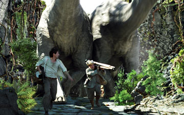 king kong - Jack Driscoll (Adrien Brody) and Carl Denham (Jack Black) try to outrun the Brontosaurus stampede