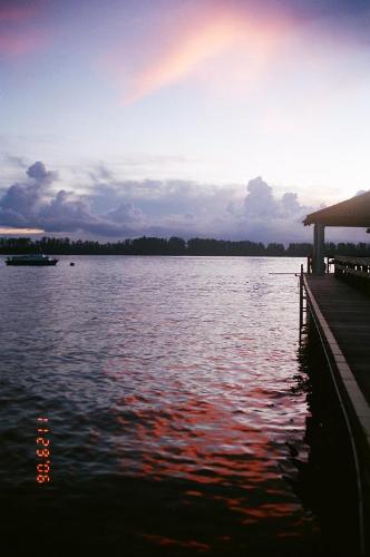 Waters of Singapore - Sunset rays reflected in the waters of Pulau Ubin Singapore.  Taken at around 7:00 p.m. on a beautiful November afternoon.