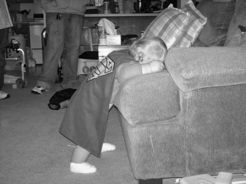 Sleepy - Brenden with his head down while Daddy talks to Uncle Kris.