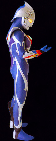 Ultraman Nexus (Junis Blue) - After Ultraman joins with the third deunamist, Ren Senjyu, his Junis mode changes from red to blue. With it, he also has the ability to utilise a new range of powers.  Height: 49 meters Weight: 42,000 Tons