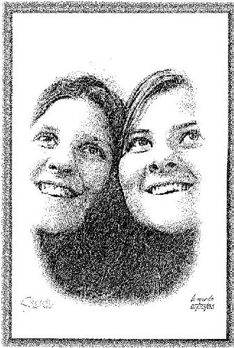 My girls:) - This picture was taken in one of those booths at the mall.