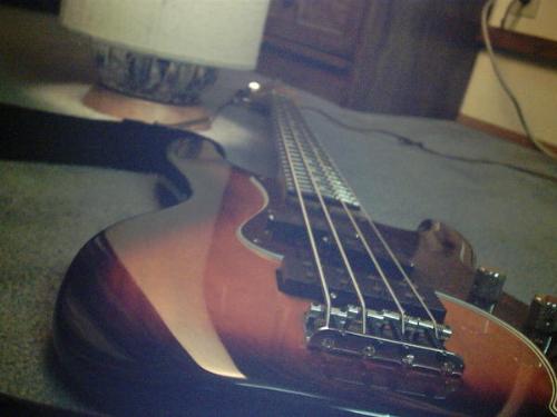 bass - This is my Fender Precision Deluxe bass guitar.