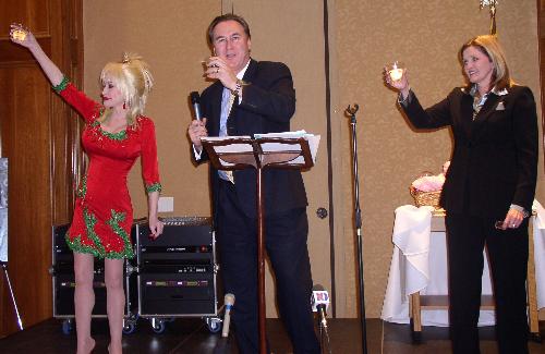 Dolly Parton - Dolly Parton at a reception where she donated money to build a hospital.
