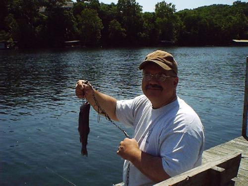 Catch of the day! - Jeff caught a fish! Yea!