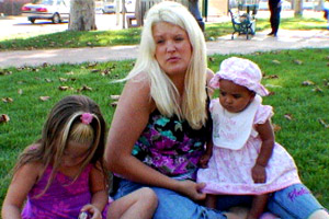 Ashley and her kids - This is a picture osf Ashley and her two beautiful kids, who are homeless. They live in a shelter now. Thank God she starts a new job Monday. LowerMyBills.com gave her some money to help her get on her feet. Isn't that a blessing.