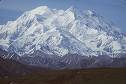 Denali National Park - Mount Denali, one of the world's tallest peaks glows with snow in the background.