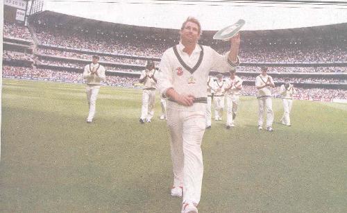 shane warne - this picture taken at the moment of leaving the ground of aussie team.
in this particular match shane warne completed yet another milestone by reaching his 700 test wickets