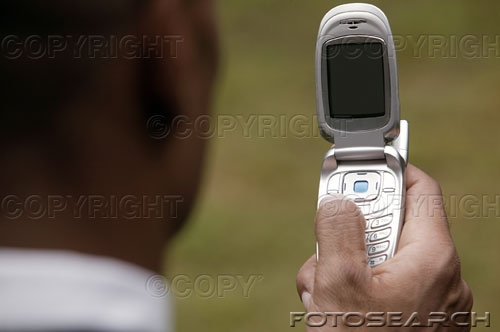 Cell Phone - Man using Cell phone Cell Phone - Man using Cell phone