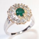 Emerald Ring - photo of an emerald and diamonds ring set in white gold/platinum similar to one I have.
