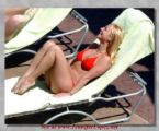 sunbathing - just to make skin tan