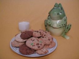 Before Photo. - Frog-shaped cookie jar coupled with a few delicious treats. Before the cookies were stolen. Can you help solve this mystery?