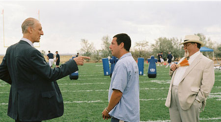The Longest Yard - Paul 'Wrecking' Crewe was a revered football superstar back in his day, but that time has since faded. But when a messy drunk driving incident lands him in jail, Paul finds he was specifically requested by Warden Hazen (James Cromwell), a duplicitous prison official well aware of Paul's athletic skills. Paul has been assigned the task of assembling a team of convicts, to square off in a big football game against the sadistic guards. With the help of fellow convict Caretaker, and an old legend named Nate Scarborough to coach, Crewe is ready for what promises to be a very interesting game. It's only the warden and the guards who have no idea who or what they're up against, with Paul the driving force behind the new team.  Source: http://www.imdb.com/title/tt0398165/plotsummary