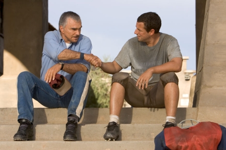 The Longest Yard - Paul 'Wrecking' Crewe was a revered football superstar back in his day, but that time has since faded. But when a messy drunk driving incident lands him in jail, Paul finds he was specifically requested by Warden Hazen (James Cromwell), a duplicitous prison official well aware of Paul's athletic skills. Paul has been assigned the task of assembling a team of convicts, to square off in a big football game against the sadistic guards. With the help of fellow convict Caretaker, and an old legend named Nate Scarborough to coach, Crewe is ready for what promises to be a very interesting game. It's only the warden and the guards who have no idea who or what they're up against, with Paul the driving force behind the new team.  Source: http://www.imdb.com/title/tt0398165/plotsummary