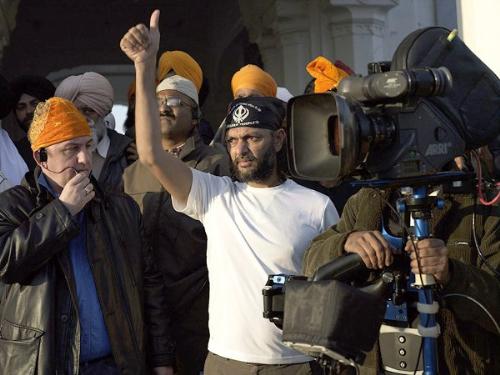 Rang De Basanti - Director showing the sign that 'Everything Is Ready'.