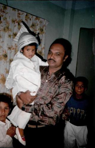 In a wedding ceremoney - Little boy wearing a dress which generally wear by bridegroom at Wedding Ceremony Myself with this boy in this ceremoney