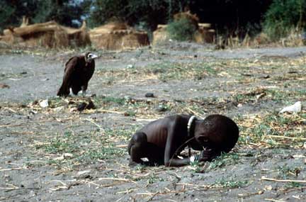 Photo that haunted so many people - the photo was taken by south african photo grapher kevin carter during sudan famine, he was awarded best photograpg of the year..he later suicided after this incident...