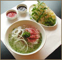Pho  - Vietnamese pho noodles in a hot steaming beef broth