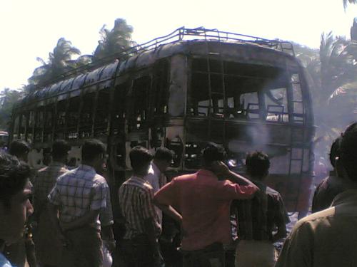 Fire in a private bus - In an accident... Private bus was coming wid very high velocity...abt 70-80 km per hr.. in indian road... it lost control..n hits a fishman's bike bike was hooked in bus'sfront wheel...n scratched for abt 200 mts.. bike's petrol tank was damaged n leaked.. n due to spark... everthing burned.. excpt ppl who ran away... fisherman is @ hospital eyyt now