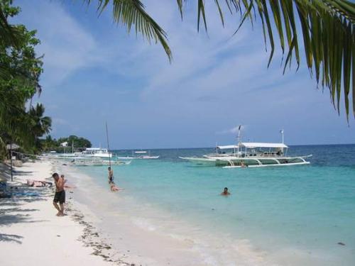 panglao island - one of my favorite destination every summer! white sand affordable cottages and very hospitable pipol makes the place more enjoyable!