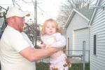 Son and granddaughter - Son holding granddaughter.