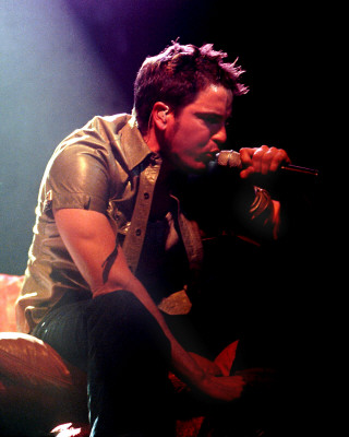 Third Eye Blind -  Falling between Hootie the Blowfish and Live, Third Eye Blind's catchy and melodic post-grunge made the group's first single, 'Semi-Charmed Life,' into a hit in the spring of 1997. The San Francisco-based quartet consisted of Stephan Jenkins (vocals), Kevin Cadogan (guitar), Arion Salazar (bass), and Brad Hargreaves (drums). After earning an English degree from the University of California at Berkeley, Jenkins concentrated on playing solo shows in the San Franciscan scene. He spent four years playing in local bands before beginning a solo career; however, shortly after he set out on his own, he decided to form a band. After several lineups failed to gel, former Fungo Mungo bassist Arion Salazar joined the group, which was now called Third Eye Blind. At one of the band's shows, guitarist Kevin Cadogan, a former student of Joe Satriani who later became involved in the northern California ska and punk scenes, introduced himself to Jenkins. Cadogan joined Third Eye Blind in late 1995, bringing along former Counting Crows drummer Brad Hargreaves, as well.As Third Eye Blind was getting off the ground, Jenkins was earning major-label attention through his production of the Braids' cover of Queen's 'Bohemian Rhapsody,' which became an international hit. Shortly afterward, he signed a publishing deal, which was reported to be the largest ever for an unreleased artist. By playing the Bay Area frequently, Third Eye Blind cultivated a dedicated fan base, and the group's original 14-song demo attracted the attention of major labels. The buzz was continuing to build on Third Eye Blind when the group finagled their way to a prized opening slot for Oasis' April 1996 concert at San Francisco's Civic Auditorium. At the time of the concert, the group was unsigned, but following their well-received performance, the band became the subject of a bidding war. The band signed with Elektra/Asylum because the label offered the most artistic freedom, which included enlisting Jenkins as the album's producer. Upon signing to Elektra, he was offered a production deal to help develop new bands.