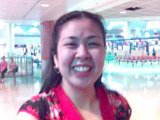 chinese look... - its me 'chinese look' hehe coz im wearing a chinese dress hehe.. taken from changi airport in singapore, im going back to phils. dat tym...