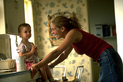 Erin Brockovich - Erin Brockovich is an unemployed single mother, desperate to find a job, but is having no luck. This losing streak even extends to a failed lawsuit against a doctor in a car accident she was in. With no alternative, she successfully browbeats her lawyer to give her a job in compensation for the loss. While no one takes her seriously, with her trashy clothes and earthy manners, that soon changes when she begins to investigate a suspicious real estate case involving the Pacific Gas & Electric Company. What she discovers is that the company is trying quietly to buy land that was contaminated by hexavalent chromium, a deadly toxic waste that the company is improperly and illegally dumping and, in turn, poisoning the residents in the area. As she digs deeper, Erin finds herself leading point in a series of events that would involve her lawfirm in one of the biggest class action lawsuits in American history against a multi-billion dollar corporation.  Source: http://www.imdb.com/title/tt0195685/plotsummary