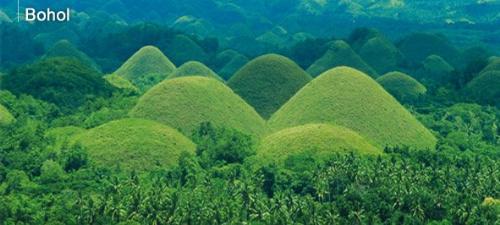 Famous tourist spot in the Philippines - Bohol's The Chocolate hills- of all 1,268 cone-shape hills are undoubtedly the most famous tourist attraction in the province of Bohol, PHilippines.