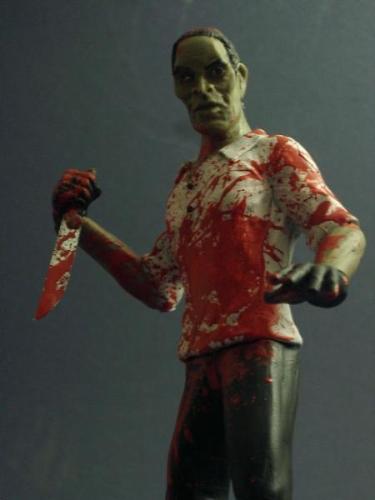 OJ Simpson Action Figure - OJ Simpson slasher action figure with bloody knife.