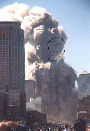 911 - faces in the smoke in WTC collapse